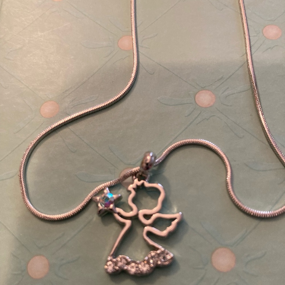 Silver Angel Pendant Necklace with Star Accent